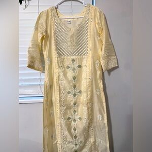 Traditional women’s Indian outfit beautiful detail dress with pants medium beige